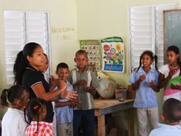 teacher and students in the first primary school built in hondo valle school built by goldquest